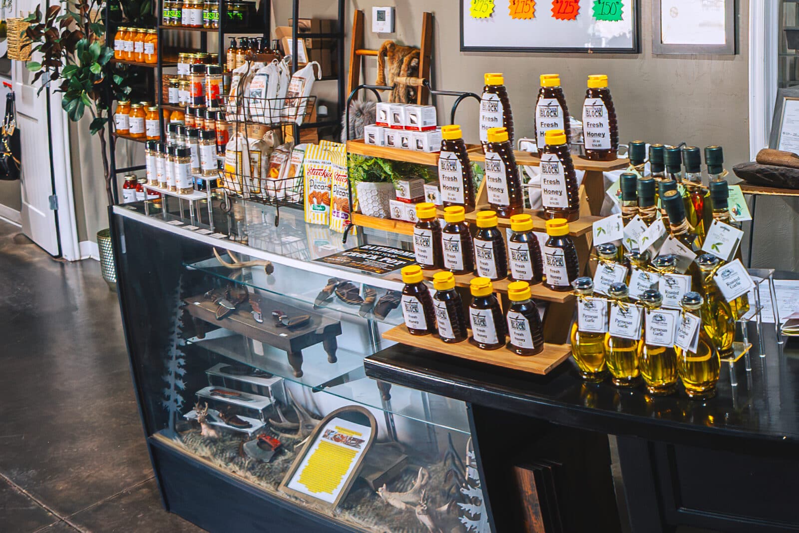 Jars of local honey and beef tallow on the front counter